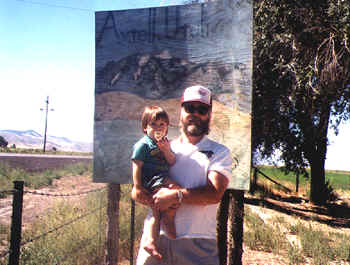 Axtell, UT painted plywood sign